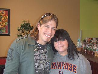 JMC & Me - This was a picture taken a few days ago with my favorite singer. Jason Michael Carroll is a country music artist. He is a wonderful singer and person. We have seen him over 40 times now and each time feels like the first. He has had to top 5 singles and his first album was the #1 in 2007. He is currently working on his second album. So far what we have heard there will be many top hits off this one also. Jason is someone who cares about his fans and doesn't forget a face. We love him and know you will too!