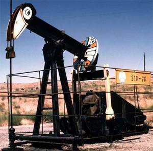 Oil - This photo is a picture of a "nodding donkey", a machine used for the purpose of oil production. 