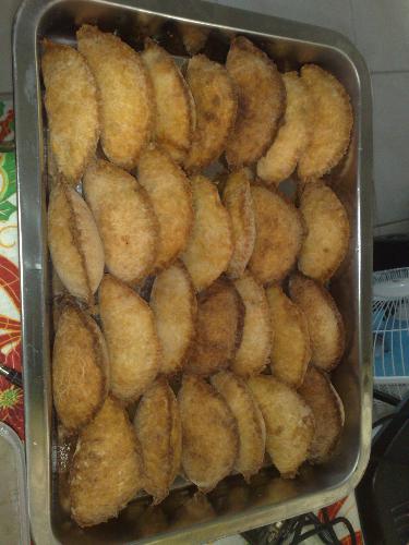 eating food - empanada