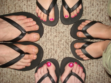 flip family - Everyone in my family loves to wear flip flops. And we bought matching ones this summer! lol Basic black of course because we are two females and two males!