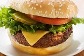 cheeseburger - photo of Cheeseburger with tomato and gherkin