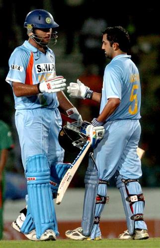 Yuvraj - Yuvraj singh congratulating gautam gambhir during a cricket match