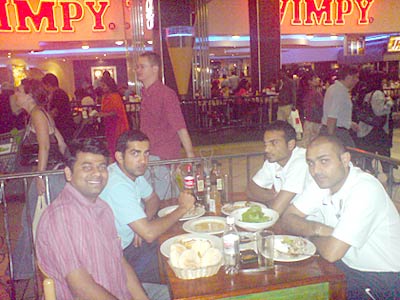 Cricketers - Cricketer from India in a restaurants virendra sehwag, gautam gambhir and other players and friend