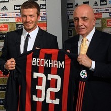 David Beckham and AC Milan vice-president Adriano  - This is a picture of English midfielder David Beckham posing with AC Milan vice-president Adriano Galliani after Beckham was signed by AC Milan on a two month from the L.A. Galaxy