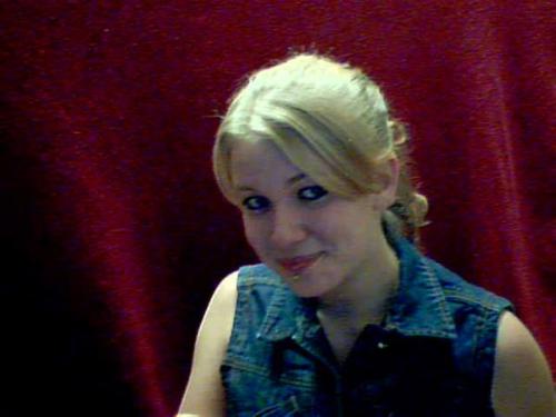 Just lil' ol' me - I've never been able to afford to have my picture professionally taken, so I decided to do it myself. With my cheap $20 web cam, a red blanket draped behind me, and a lamp in front of me, I snapped a few pictures. They don't look professional, but they're the best I got until I can actually afford th get the real thing done! I really like this one because I look a-lot like my mom, who I love, adore, and look up to!