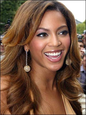 Beyonce-cute smile - she is a rockstar...& she has such a cute smile...very iconic...