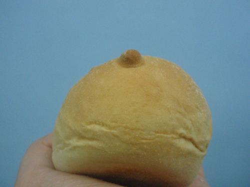 boob bread - This is an ordinary pandesal that just so happened to have a bubu that looks like a tit. Funny :D