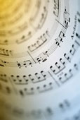 Music - Close up of sheet music rolled up