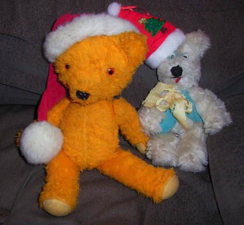 Teddies at Christmas - 2 old Teddies in Santa hats