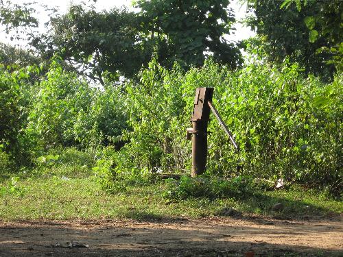 Water - This tubewell stands for water that is heavily needed for the thirsty travellers in the noon of a hot humid summer.