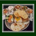 indian food - i love indian food a lot. this is a plate full of a variety of Indian food in it. indians are big foodies and love to eat a variety of food at one meal.
