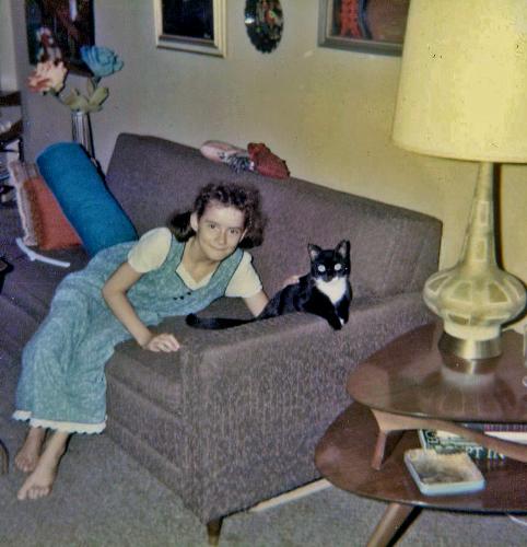 Me as a young girl with Babette - image of me and Babette, my first cat