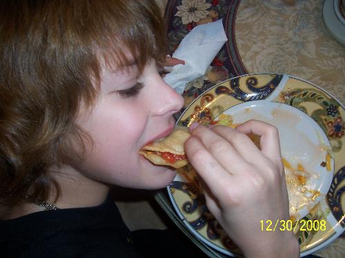 My son having a taco - This is my 13 year old that can eat 10 tacos if I let him.