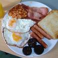 English Breakfast - A typical English breakfast has scrambled eggs, bacon, sausages, black pudding, mushrooms, baked beans, hash browns and half a tomato. English Breakfasts are filling and keeps you active throughout the day. Is'nt there a saying breakfast is the most important meal of the day.