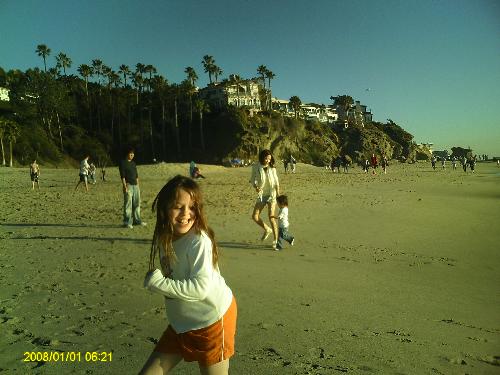 My Daughters First Visit To The Ocean - We took my daughter to the ocean for the very first time this is a picture of her running from the waves. She was so certain that she was gonna be sucked back into the ocean when the waves went back out. We had a great time and it was so much fun to see how much fun she was having.