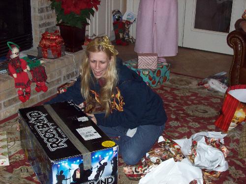 Christmas morning - The look on my daughters face Christmas morning was priceless when she found out she got the Rock Band game she had been wanting for months. What more could a mother ask for? 