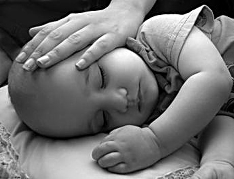Baby sleeping - Baby sleeping by feeling the warmth of her mother.