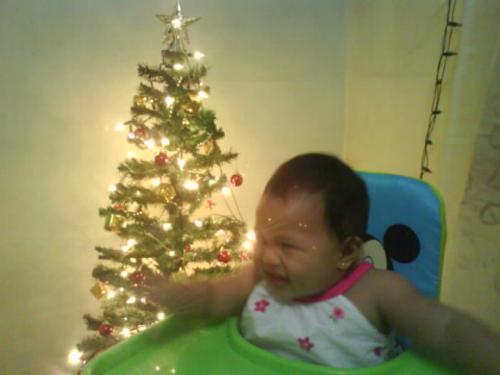 Hailey&#039;s first Christmas tree - Photo is taken with Hailey&#039;s very first Christmas tree..