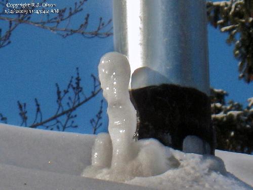 Ice/mpisture - A shot of my heat chimney recently with the
ice formed from the frigid temps as of late. Ice/mpisture - A shot of my heat chimney recently with the
ice formed from the frigid temps as of late.
