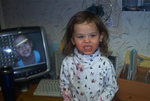 My Daughter a few years ago - I took this pic of my daughter a few years ago as you can see her face is rather red and there is red smears on her shirt. She got into my blush dont she look just fabulous. LOL. Well I thought it was kinda cute and wanted to share it with you all.