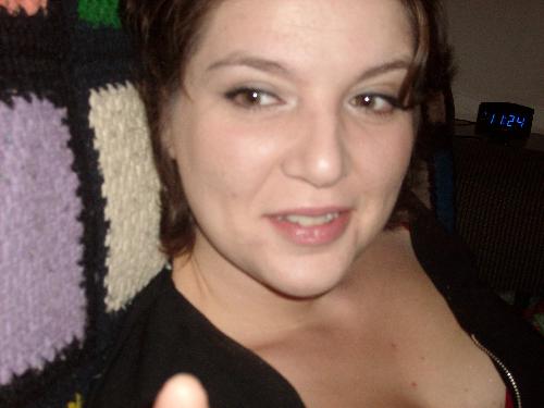 Me on New Years Eve - Fayeslongo, Faye on New Years Eve. I was sitting on my roommates couch and her boyfriend snapped a pic while I wasn't looking. It seems the only good pictures I take are in the ones I'm not expecting.