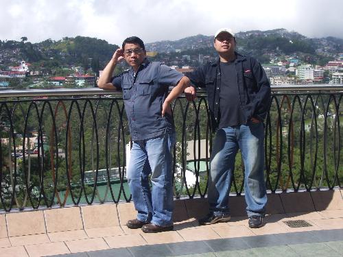me and my father - this is a pic of me and my father. the wind is very cold here in baguio.