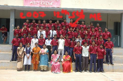 my school and my class mates - me with my school class mates our class 12 a sectiom and our t shirt denotes the house of the class its caleed santhome house but now in college