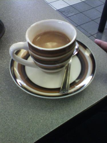Espresso 1  - My husband and I stopped into a little coffee shop today, that I had not been in in about 15 years. Aside from a new paint job, and some great new cups, the place had not changed a bit. i loved my little espresso cup so much, I wished i could have taken it home with me. I thought the design was awsome.