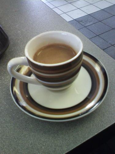Espresso 1  - My husband and I stopped into a little coffee shop today, that I had not been in in about 15 years. Aside from a new paint job, and some great new cups, the place had not changed a bit. i loved my little espresso cup so much, I wished i could have taken it home with me. I thought the design was awsome.