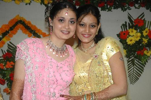 two beauties.. - posing in a marriage function....