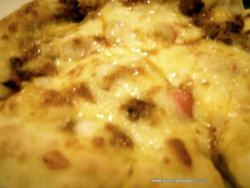 Yummy.. the most delicious pizza - Mozarella cheese inside .
