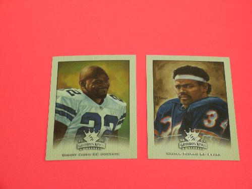 Emmitt Smith and Walter Payton - Two sports cards of a defunct company named Donruss, these two cards represent some of the most beautifully designed cards in sport card history.