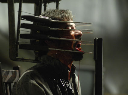 A still from saw iv - The plot jigsaw plants to kill people,the game in his words are really an art of crude technology. I can never imagine being put in such a situation & coming out of it....