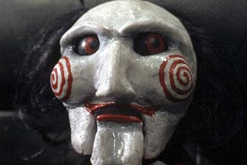 saw puppet mask - this mask reminds of the scary adventures that jigsaw under takes..the torment that people he chooses face. The saw series is one of the finest psychological thriller of all time.I recommend everybody to watch it.
