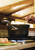cooking - a photo of A steaming pot on a stove top