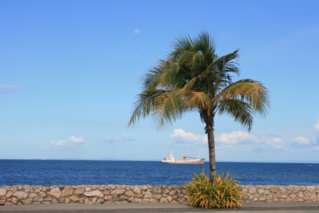 Ocean Front View in Naga - This photo was taken on a day out travelling down the southern coastal road in Cebu,Philippines. The location is Naga near the City Hall.