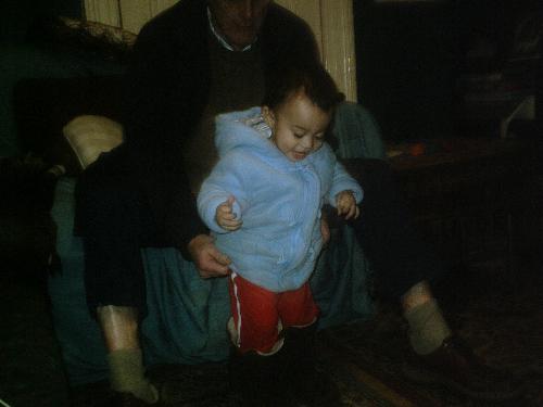 No One can Fill Your Shoes Mom - My son wearing my shoes. I remember myself doing this as well. I've also seen other kids wearing their parents clothes. This is a phase that my 18 month old son is going through.