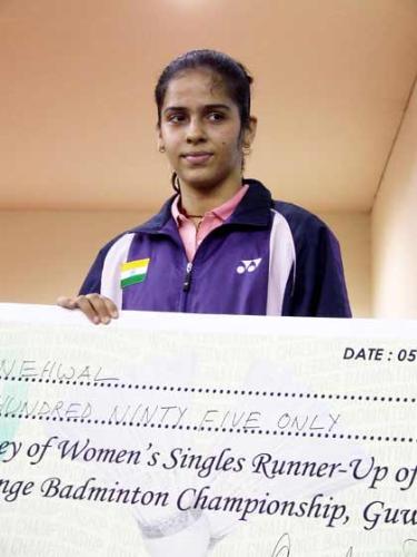 Saina Nehwal - Saina Nehwal with the cheque