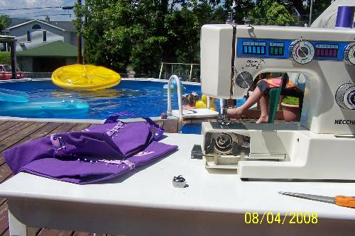 Sewing and Watching The Kids in the Pool @ The Sam - Sometimes, I just need to get things done. And, the kids were swimming while I needed to sew. So, I got an extension cord, and took my machine outside. The kids had safe fun, and I was sewing too!