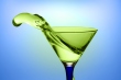 drinky drink - Apple martini splashing out of the martini glass.