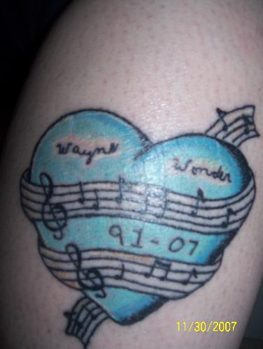 My Memorial Tattoo for my nephew - The tattoo is a memorial one for my nephew the heart is blue because it was both of our fav color, and the music notes are there because he loved music as well as me, and the most special part is his name is in his writing the tattoo artist took the stencil from his school work!