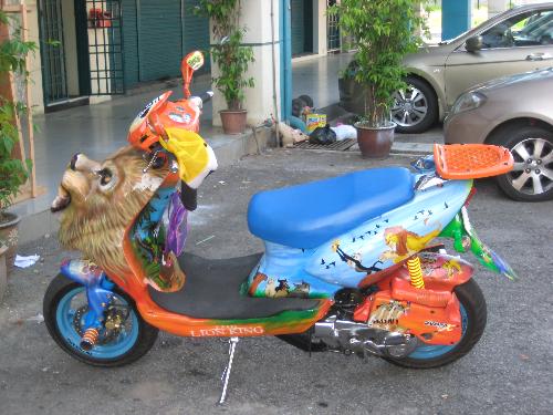 Extraordinary Lion King Air Brushed Motorbike - A creatively airbrushed motorbike - Lion King Theme.