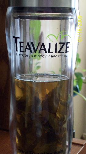 My slenderizing tea  - A picture of the Teavalize diffuser and the cool tea leafs floating around inside.
