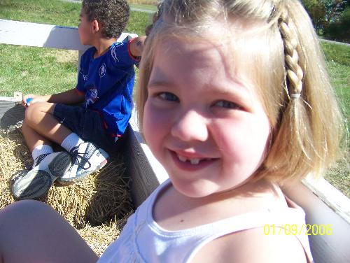 Pumpkin patch - Our oldest daughter on hayride at Pumpkin patch