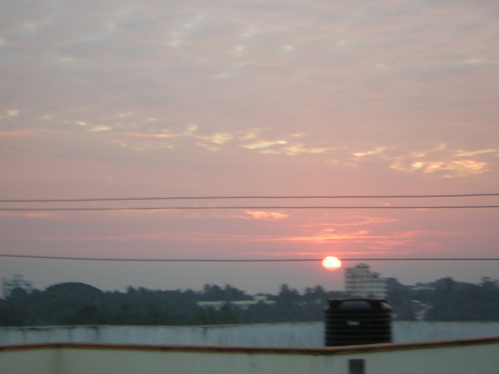 Sunset - Daily from my house i can see the beautiful scenic environment. The sunrise,sunset all look beautiful from my house.