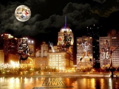 Steelers - This is a picture of pittsburgh with some of the players in the buildings as well as a terrible towel on the river. The moon also has the steeler's logo in it. It's an awesome pic. Pittsburgh's going to the super bowl!