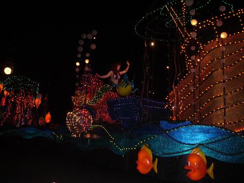 parade ariel - disney parade of lights, spectro magic at magic kingdom in disney world