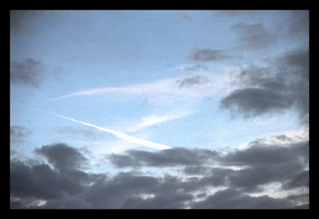 Trail of a Jet plane - The photograph was taken during the evening immediately after a Jet plane had flew past leaving behind a trail, on the blue sky. Luckily I was atop the terrace of my house, and happened to be with my camera and was able to take this shot.