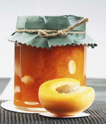 Jar of apricot jam - Delicious apricot jam made to be a gift for grandmother. The jam is made of fresh apricots and lots of sugar, aged for some time so everything soaks together.
To make it look like a present, tie a nice ribbon on jar&#039;s lid.