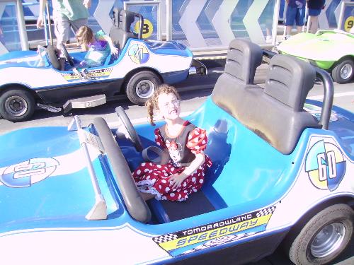 in a car - my daughter driving a car at disney